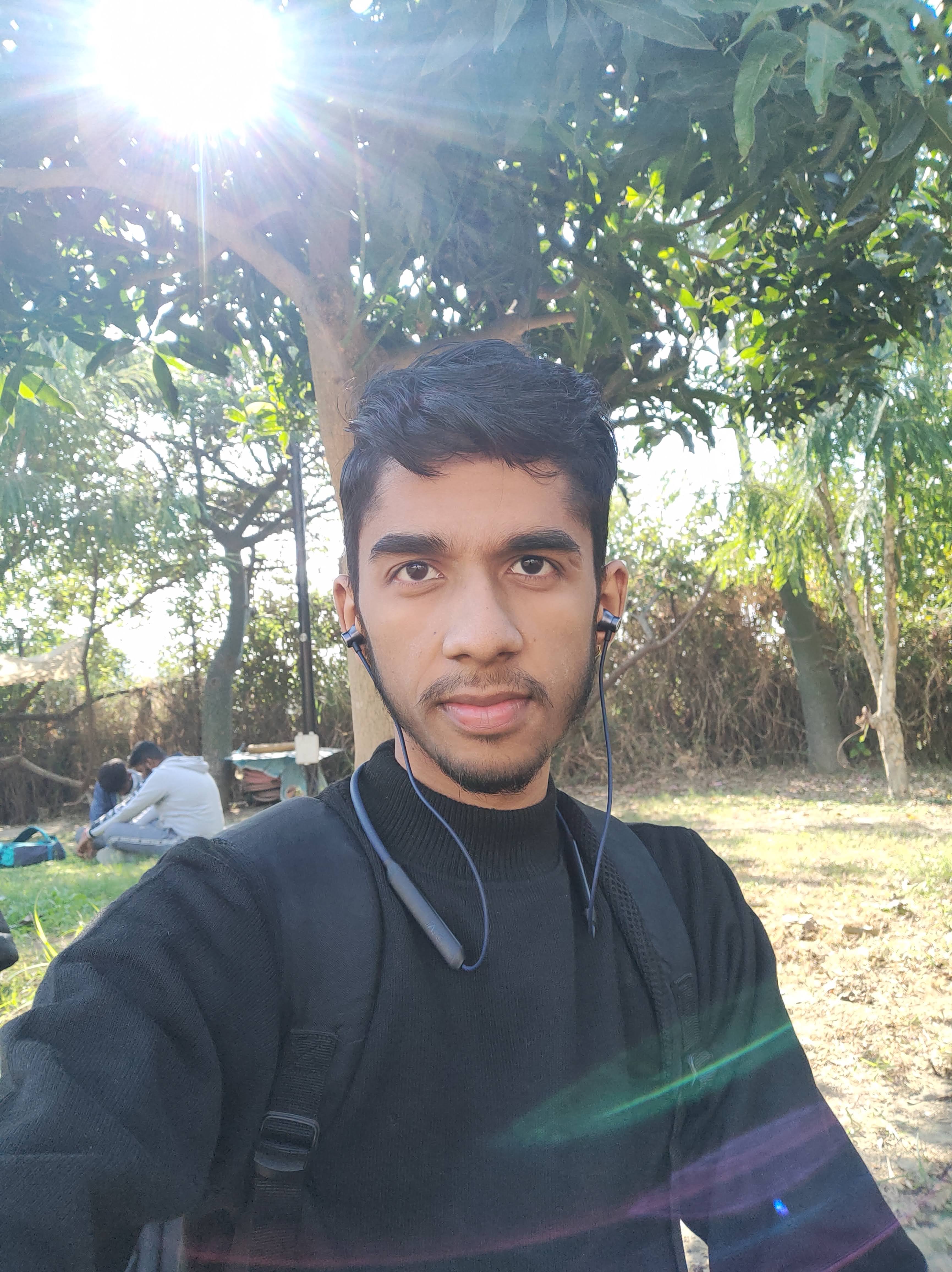 Arpit Tyagi wearing black high neck